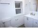 Updated bathroom with new vanity, fixtures, toilet, and bright lighting at 464 Longfellow St, Fuquay Varina, NC 27526
