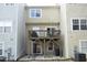 Back of house, with multiple decks, siding and various air conditioning units at 4905 Briarstone Ct, Raleigh, NC 27610