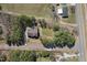 An aerial view of the home showcasing the lush surroundings and serene neighborhood at 5600 Abbey Grace Ln, Wake Forest, NC 27587