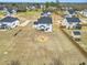 Spacious backyard featuring a fire pit with seating in a well-maintained neighborhood at 59 N Clearbrook Ct, Angier, NC 27501