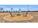 Backyard features a circular firepit area with seating, great for outdoor entertaining at 59 N Clearbrook Ct, Angier, NC 27501