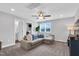 Cozy bonus room with a comfortable seating area, a ceiling fan, and natural light for relaxed living at 59 N Clearbrook Ct, Angier, NC 27501