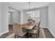 Elegant dining room featuring stylish chandelier and hardwood floors at 59 N Clearbrook Ct, Angier, NC 27501