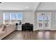 Bright living room with hardwood floors and neutral colors creates a welcoming and versatile living space at 59 N Clearbrook Ct, Angier, NC 27501
