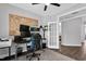 Well-appointed office space with dual monitors, a world map, and sleek, modern furnishings at 59 N Clearbrook Ct, Angier, NC 27501
