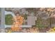 Aerial shot showing the house, driveway, yard, and bordered by a fence at 612 Lakeview Dr, Raleigh, NC 27603