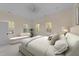 A bright and airy bedroom with neutral tones, and bright natural light at 612 Lakeview Dr, Raleigh, NC 27603