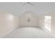 Large, bright bedroom with neutral paint, a ceiling fan, and a window view, ready for personalization at 612 Lakeview Dr, Raleigh, NC 27603