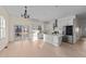 Modern kitchen featuring stainless steel appliances, an island, and seamless access to the outdoor deck at 612 Lakeview Dr, Raleigh, NC 27603