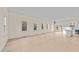 Spacious living room with hardwood floors and lots of natural light that would be ideal for gatherings at 612 Lakeview Dr, Raleigh, NC 27603