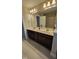 Bathroom with double sink vanity, tile floor and shower at 621 Rockcastle Dr, Cary, NC 27519