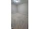 Carpeted bedroom with neutral walls and ceiling light at 621 Rockcastle Dr, Cary, NC 27519