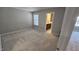 Neutral carpet bedroom with double window and ensuite bathroom at 621 Rockcastle Dr, Cary, NC 27519