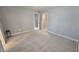 Spacious bedroom with neutral carpet and walk-in closet at 621 Rockcastle Dr, Cary, NC 27519