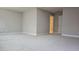 Spacious bedroom featuring neutral carpet, base trim, and a closet at 621 Rockcastle Dr, Cary, NC 27519