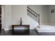 Open entryway with hardwood floors, a staircase, and a decorative bench at 621 Rockcastle Dr, Cary, NC 27519