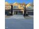 Open garage of this townhome with brick facade, offering parking and storage space at 621 Rockcastle Dr, Cary, NC 27519