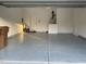 Clean garage featuring an epoxy-coated floor at 621 Rockcastle Dr, Cary, NC 27519