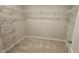 Walk-in closet with carpet and wire shelving at 621 Rockcastle Dr, Cary, NC 27519