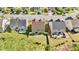 An aerial view of a home featuring a fenced backyard and a patio area at 69 Florence Dr, Clayton, NC 27527