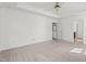Large bedroom with neutral carpet, crown molding, and ample natural light at 69 Florence Dr, Clayton, NC 27527