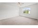 Bedroom with neutral carpet, white walls, and a window at 69 Florence Dr, Clayton, NC 27527