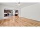 Open-concept living room flowing into the kitchen, featuring hardwood floors and ample space at 69 Florence Dr, Clayton, NC 27527