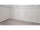 Walk-in closet featuring neutral carpet and metal shelving for storage at 69 Florence Dr, Clayton, NC 27527