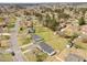 Aerial view of neighborhood with mature trees and homesites with ample lot sizes at 711 Wheat Mill Rd, Durham, NC 27704