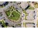 Bird's-eye view of the community with lush green spaces and manicured lawns, buildings, and parking at 714 Waterford Lake Dr, Cary, NC 27519