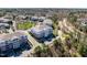 An aerial view of condominium complex showing architectural details and surrounding landscape at 714 Waterford Lake Dr, Cary, NC 27519