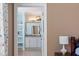 En-suite bathroom featuring a white vanity, shelving, and modern fixtures at 714 Waterford Lake Dr, Cary, NC 27519