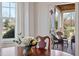 Dining room with view through to porch at 714 Waterford Lake Dr, Cary, NC 27519