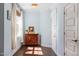 Inviting foyer with hardwood floors, a decorative cabinet, neutral paint and plenty of natural light at 714 Waterford Lake Dr, Cary, NC 27519