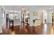 Modern kitchen features an island with seating, stainless steel appliances, and hardwood floors at 714 Waterford Lake Dr, Cary, NC 27519