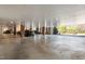 Well-lit parking garage featuring painted brick supports and a variety of vehicles at 714 Waterford Lake Dr, Cary, NC 27519