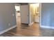 Spacious bedroom showcasing connections to the bathroom and kitchen, enhancing the living experience at 8 Elaine Cir, Durham, NC 27703