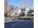 Street view of two lovely homes with well-manicured lawns and inviting curb appeal at 8 Elaine Cir, Durham, NC 27703