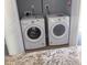 Convenient laundry closet features a modern washer and dryer, adding functionality at 8 Elaine Cir, Durham, NC 27703