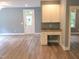 Cozy living space with hardwood floors and a built-in desk, perfect for work or study at 8 Elaine Cir, Durham, NC 27703