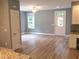 Inviting living room with hardwood floors, neutral paint, and a bright, airy atmosphere at 8 Elaine Cir, Durham, NC 27703