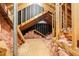 Exposed attic with spray foam insulation in between rafters and plywood decking above at 8116 Windsor Ridge Dr, Raleigh, NC 27615