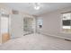 Bedroom with large mirrored closet, plush carpet, and ceiling fan at 8116 Windsor Ridge Dr, Raleigh, NC 27615