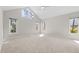 Spacious bedroom featuring carpet, lots of windows, and natural light at 8116 Windsor Ridge Dr, Raleigh, NC 27615