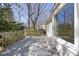Spacious wooden deck adjacent to the house, with a view of the surrounding trees in a beautiful backyard at 8116 Windsor Ridge Dr, Raleigh, NC 27615