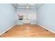 This dining room boasts hardwood floors and French doors leading to the living room, perfect for entertaining at 8116 Windsor Ridge Dr, Raleigh, NC 27615