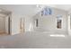 Large bedroom with vaulted ceiling, carpet and ensuite bathroom access at 8116 Windsor Ridge Dr, Raleigh, NC 27615