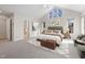 Spacious main bedroom with vaulted ceilings, carpet, and neutral decor at 8116 Windsor Ridge Dr, Raleigh, NC 27615