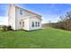 Large, grassy backyard offering plenty of space for outdoor enjoyment and relaxation at 8729 Maxine St # 38, Willow Springs, NC 27592