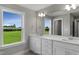 Modern bathroom featuring dual vanities and plenty of storage at 8729 Maxine St # 38, Willow Springs, NC 27592
